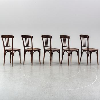 A matched set of four wooden chairs, first half of 20th Century.