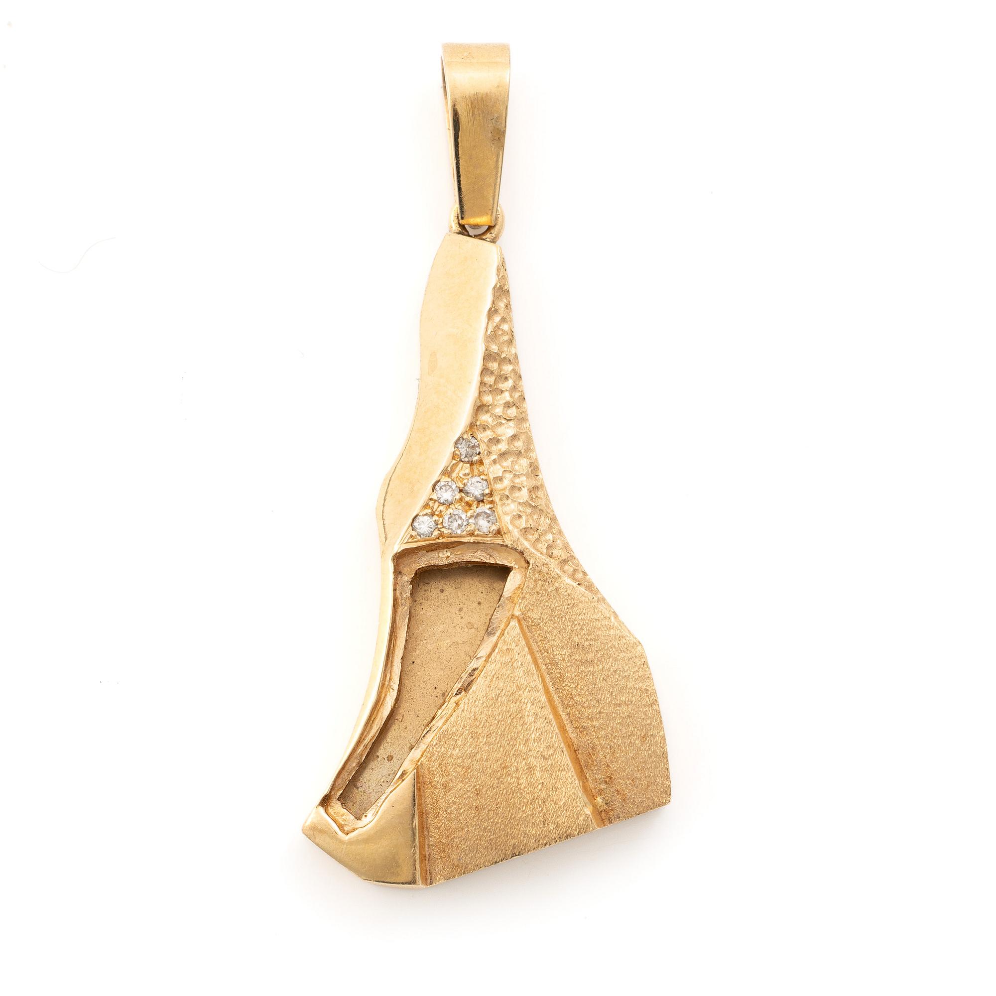 Pendant, 18K gold with small brilliant-cut diamonds.