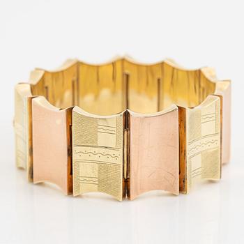 A 14K gold bracelet.