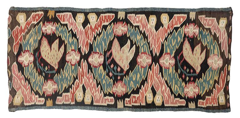 A carrige cushion, "Noaks duva" ('Noah's dove'), tapestry weave, c. 95.5 x 44 cm, Torna district, Southwestern Scania.