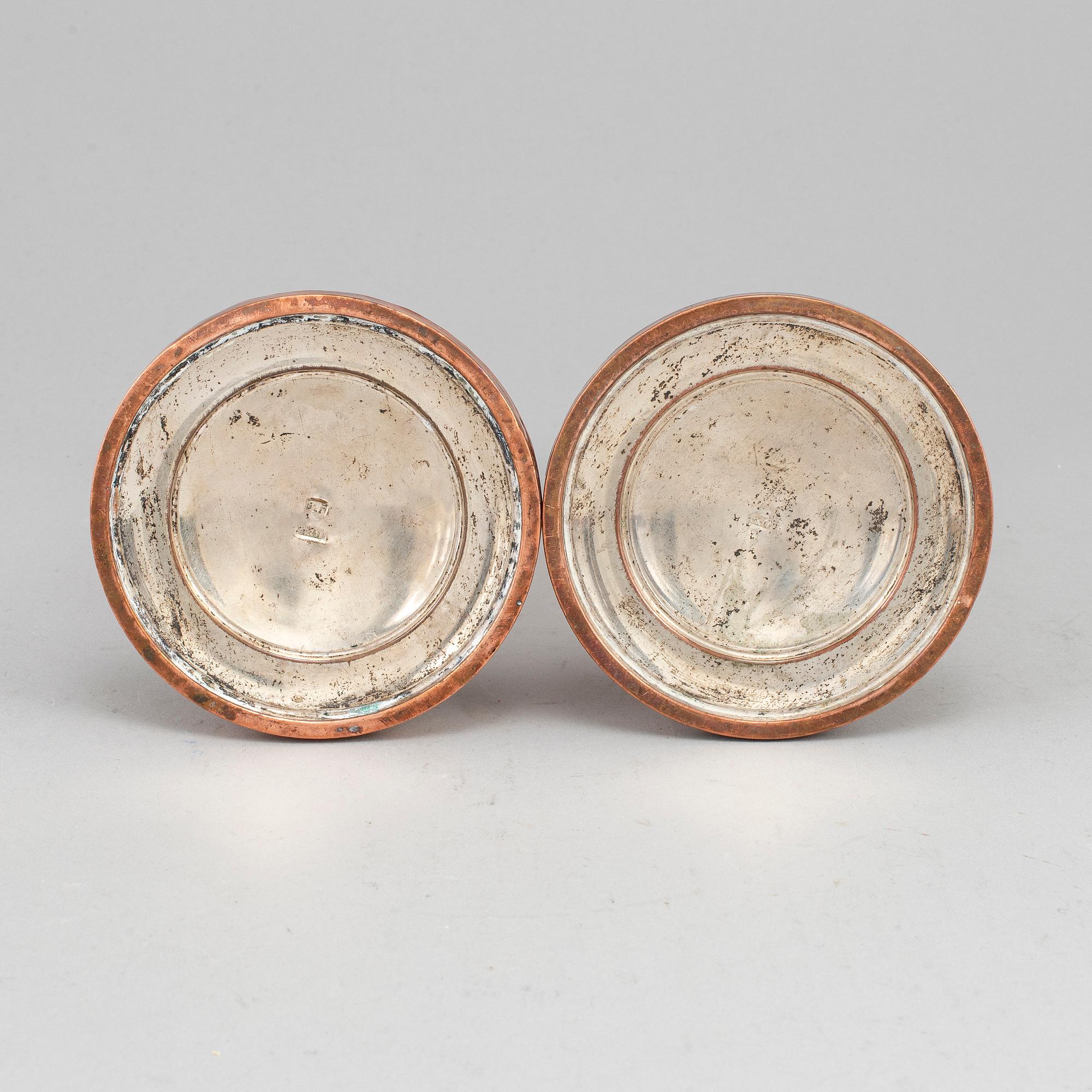 A pair of English early 19th century candlesticks.