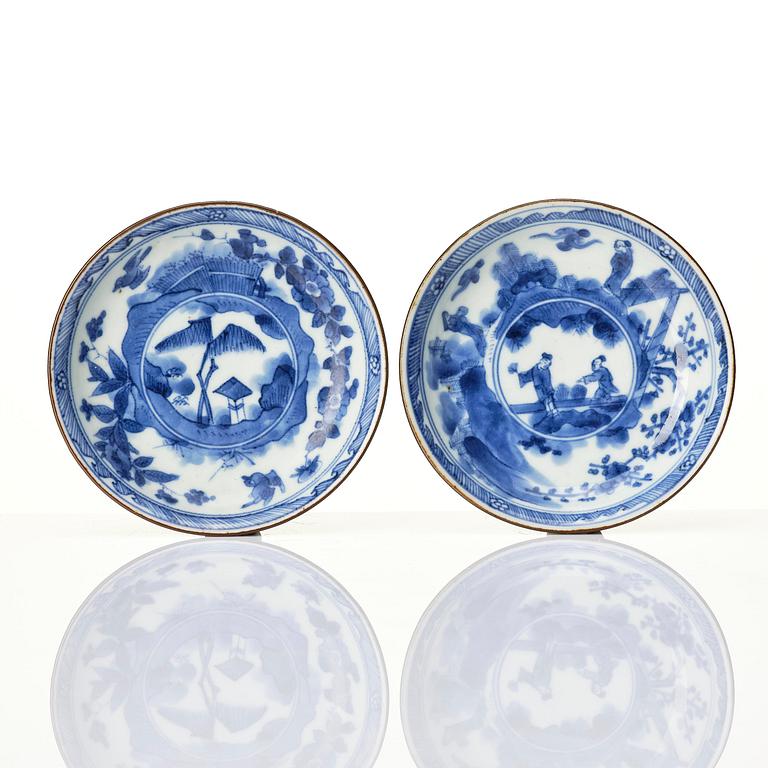 A matched set of eight blue and white cups and stands, Qing dynasty, Kangxi (1662-1722).