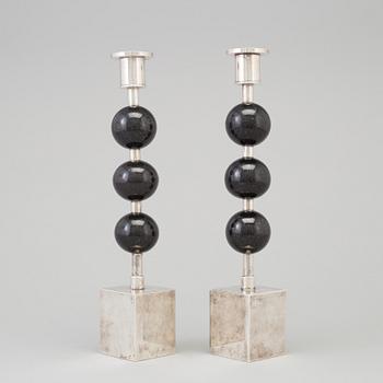 SIGURD PERSSON, a pair of silver plate and diabase candle sticks.