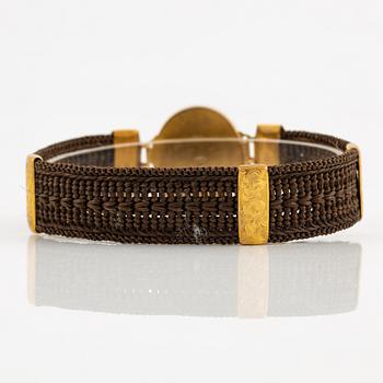Armband hårarbete och 14K guld.