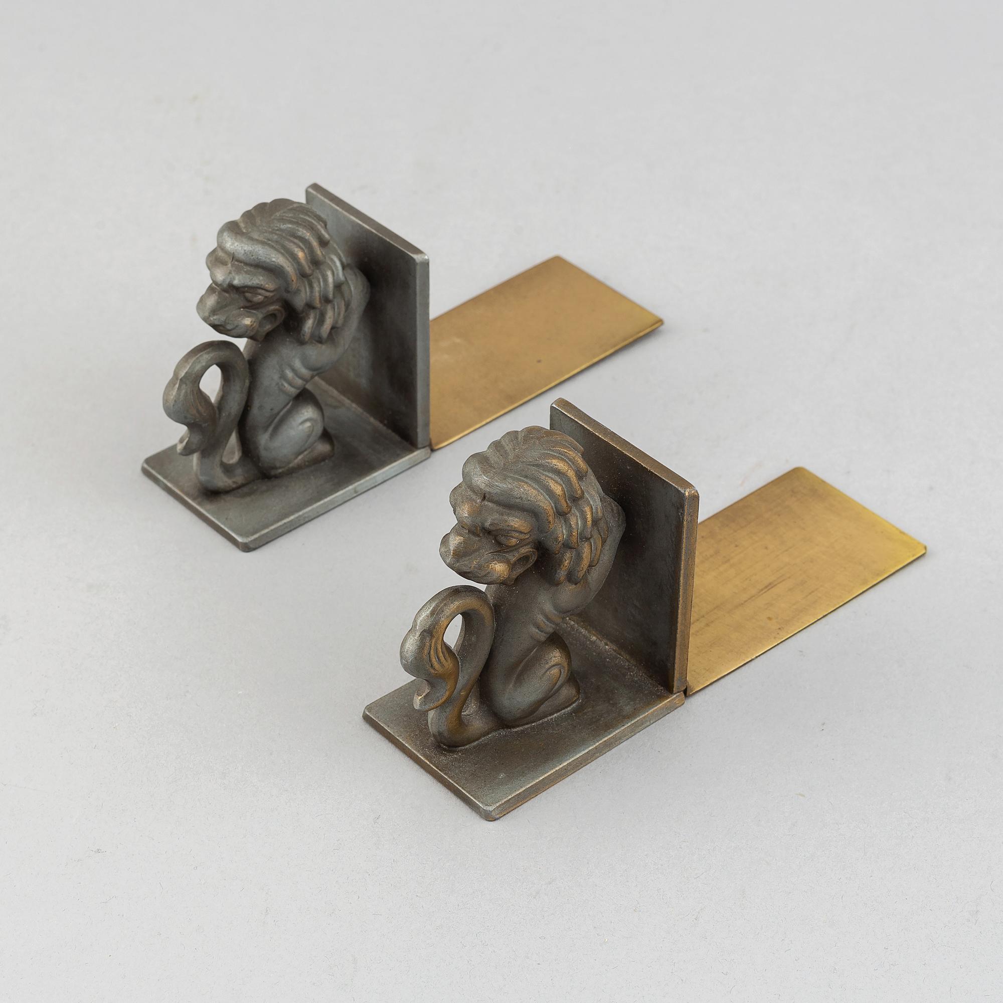 A pair of brass book ends, Stjärnmetall, 1930's.