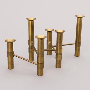 A 1970s 'Nonstop' brass serial candelabra by Hopeakeskus, Finland.