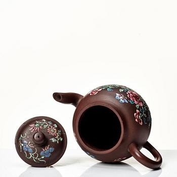 A yixing ware tea pot with cover, Qing dynasty, 18th Century.