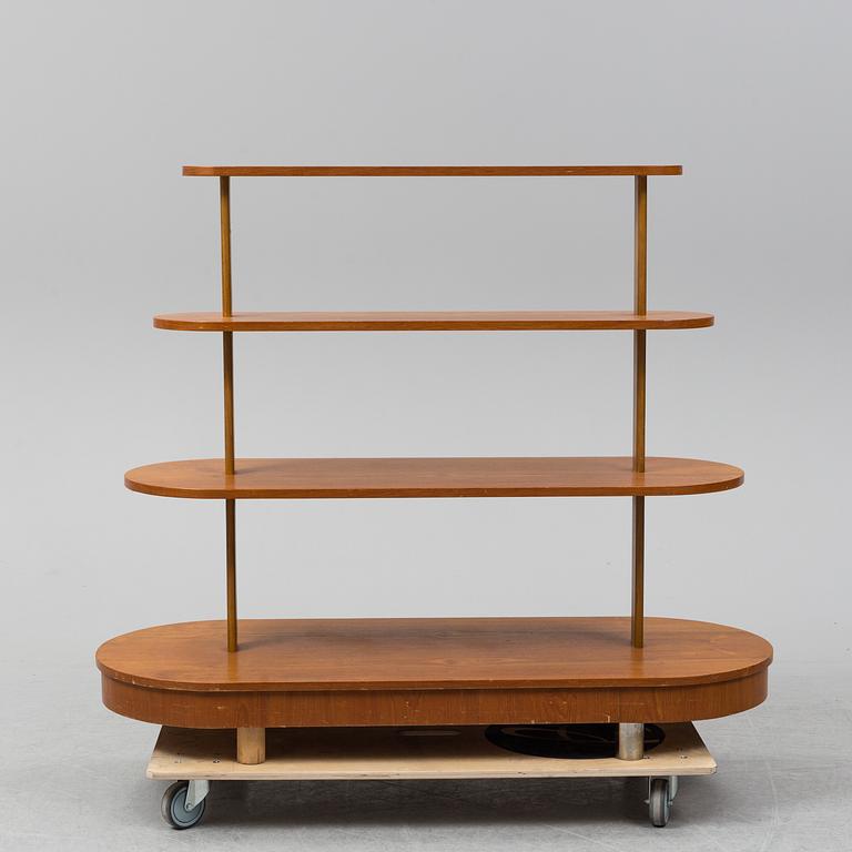 A mid Century Modern teak shelf.