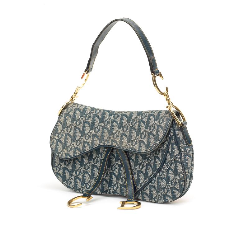 A monogram canvas handbag by Christian Dior.