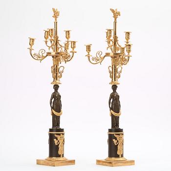 A pair of Empire early 19th century six-light candelabra.