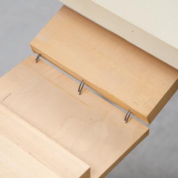 A dining table with two armchairs and six chairs by Carl Malmsten for Bodafors.