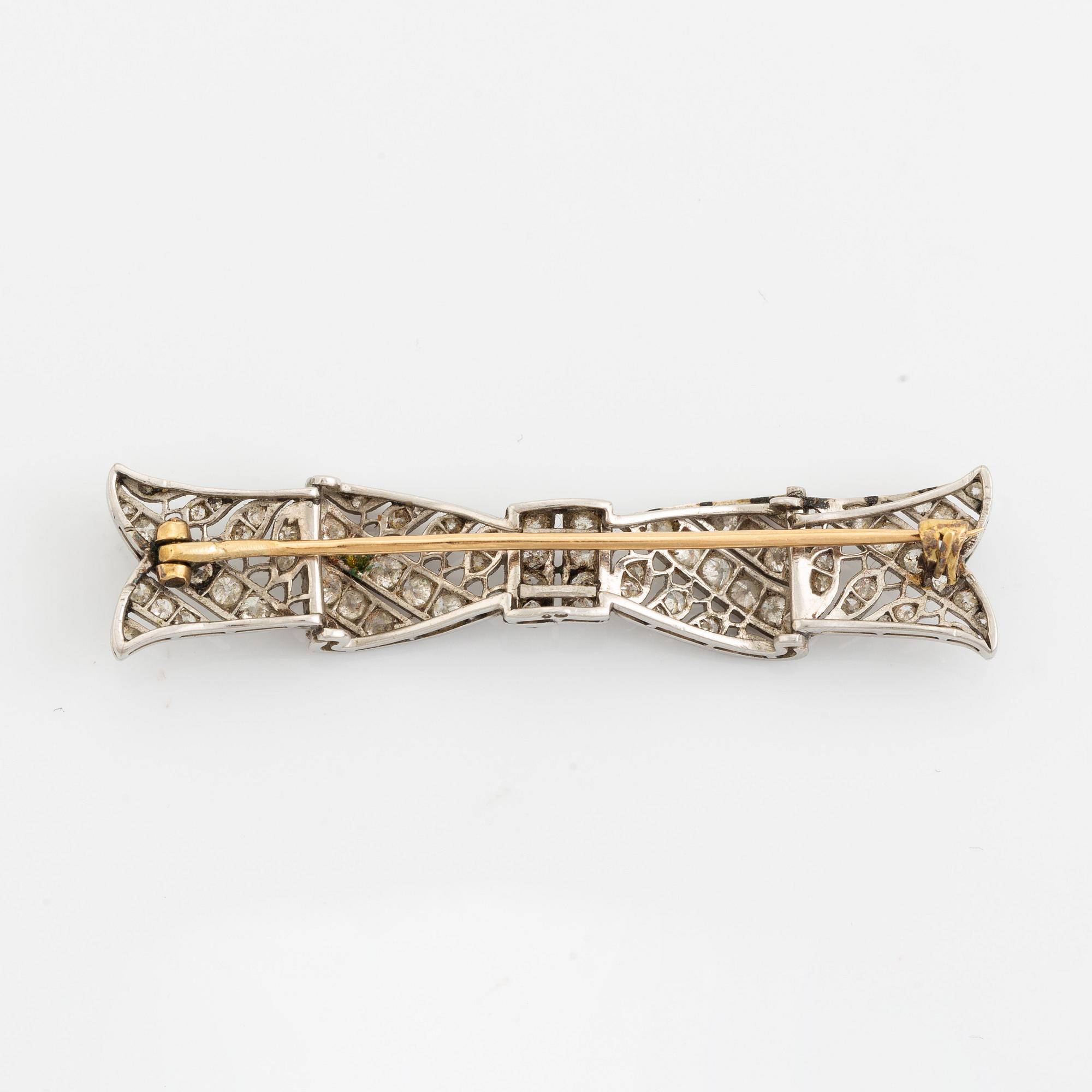 Old cut diamond bow brooch.