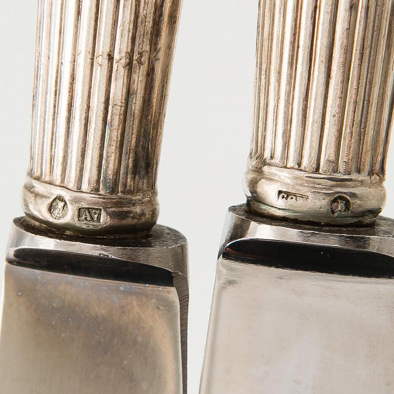 A 24-piece set of silver knives and forks, "Empire", C.G. Hallberg 1903.
