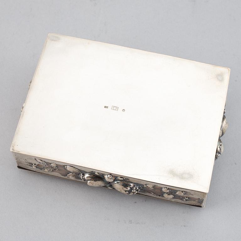 7 silver boxes.