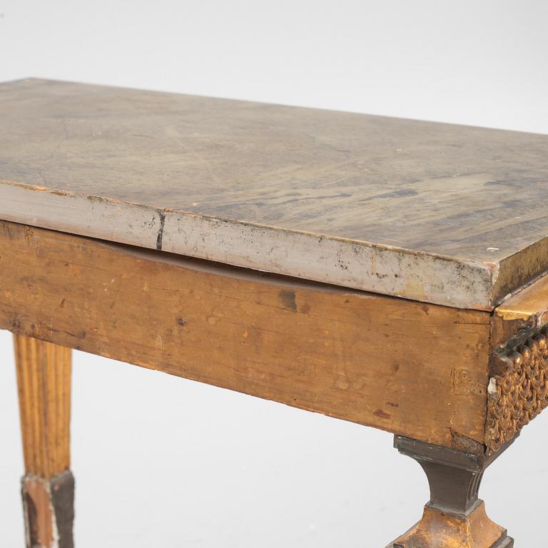 A giltwood, patinated, and faux-marbre console table in the manner of J. Frisk, Stockholm, circa 1800.