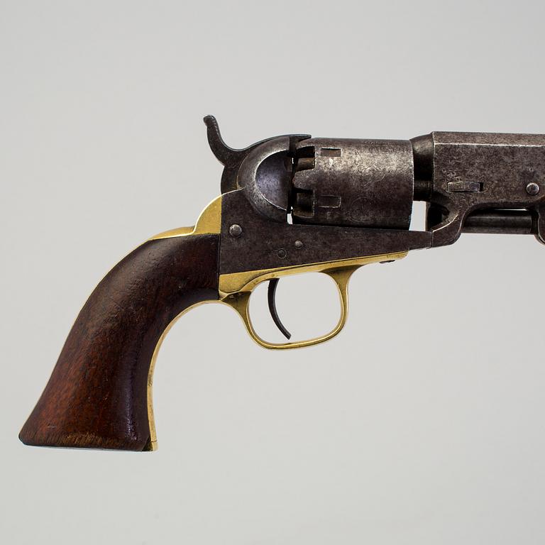 A Colt percussion revolver mid 19th century.