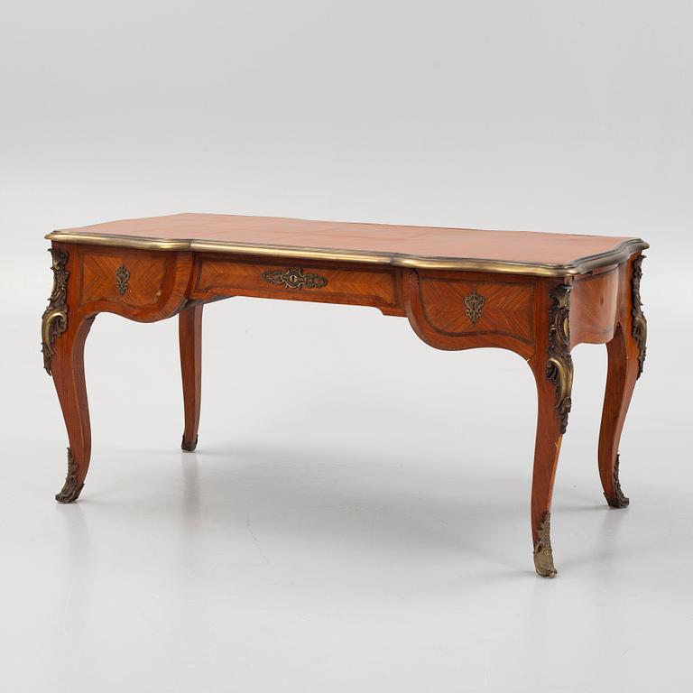 A French Louis XV-style parquetry and gilt bronze-mounted 'bureau plat', late 19th century.