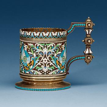 A Russian silver-gilt and enamel tea-glass holder, makers mark of Chlebnikov, Moscow 1892. Imperial Warrant.