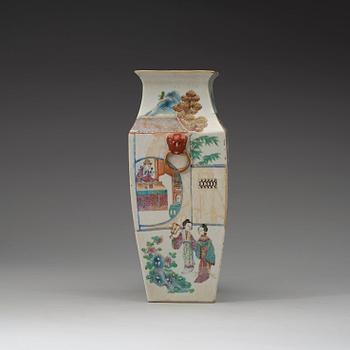 A figural famille rose vase, Qing dynasty, 19th century.