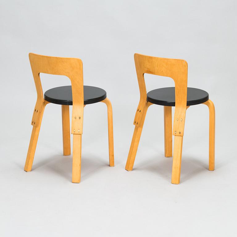 Alvar Aalto, four 1950s chairs, model 65, Artek.