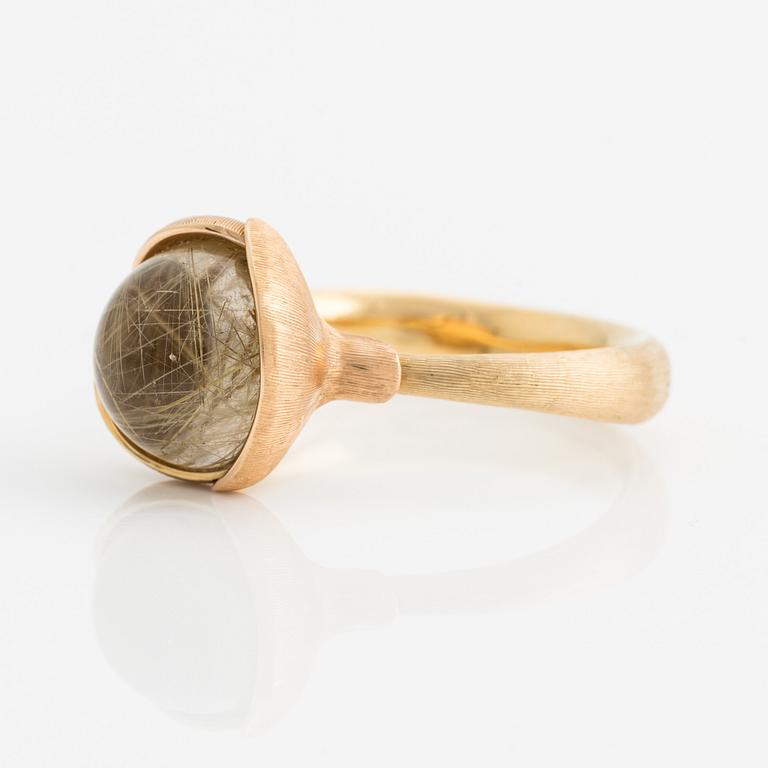 Ole Lynggaard ring in 18K gold in two colors and rutilated quartz "Lotus" no. 2.