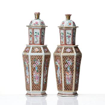 A pair of famille rose vases with covers, Qing dynasty, Qianlong (1736-95).