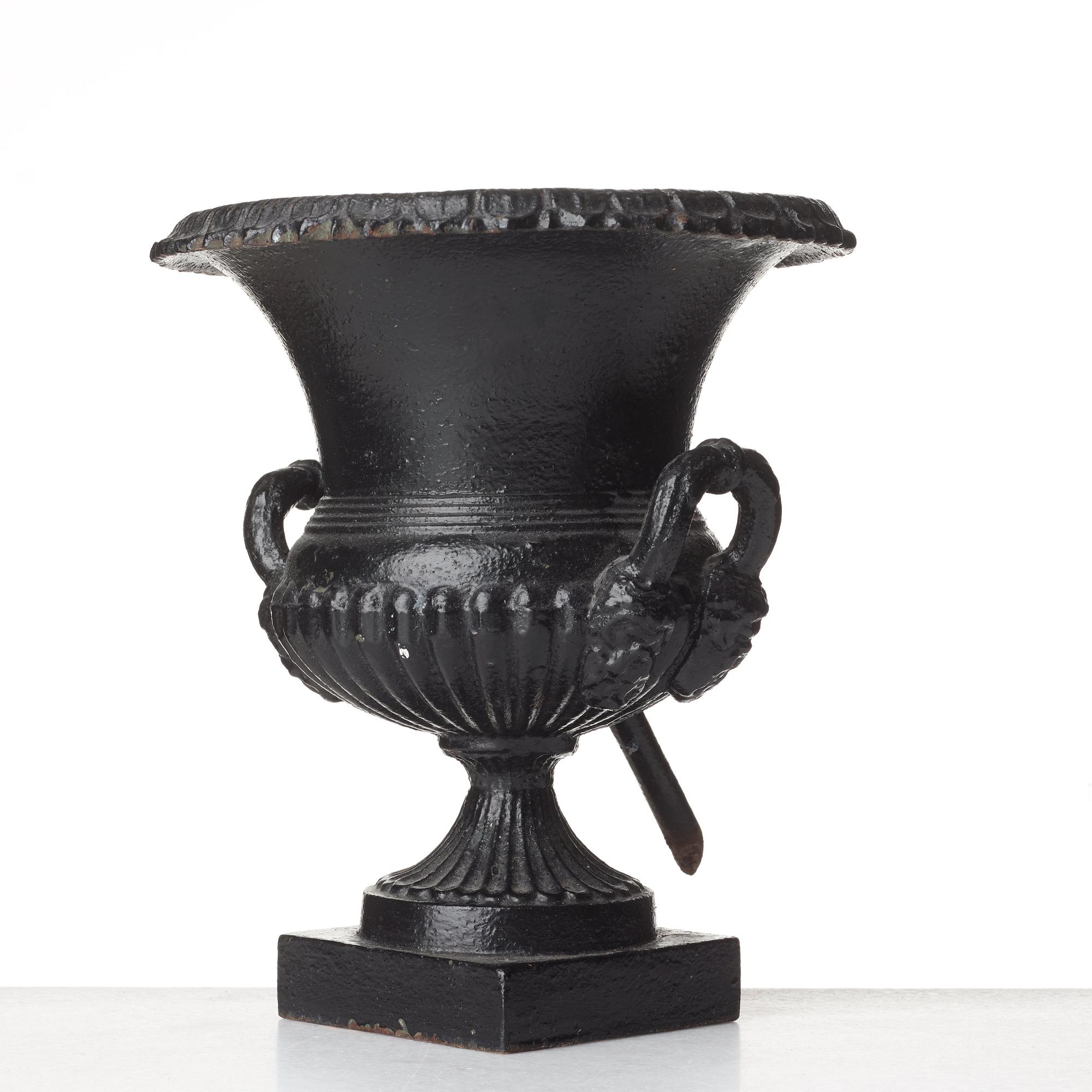 A Louis XVI-style garden urn, circa 1900.