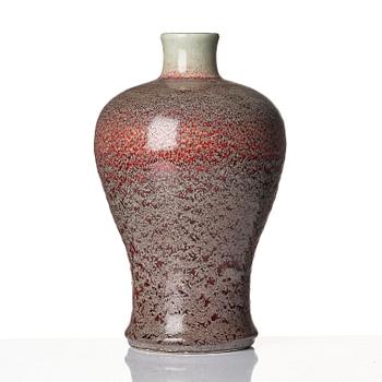 A red and ge glazed Meiping vase, Qing dynasty, 18th century.