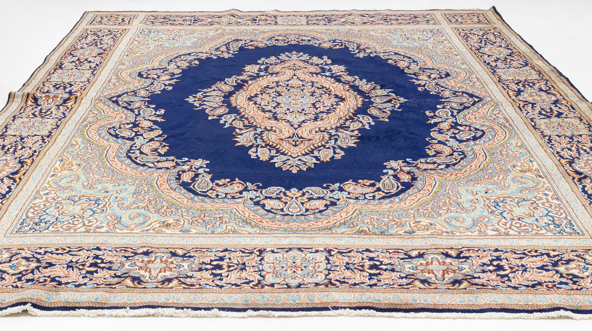 A Kerman carpet, circa 403 x 301 cm.