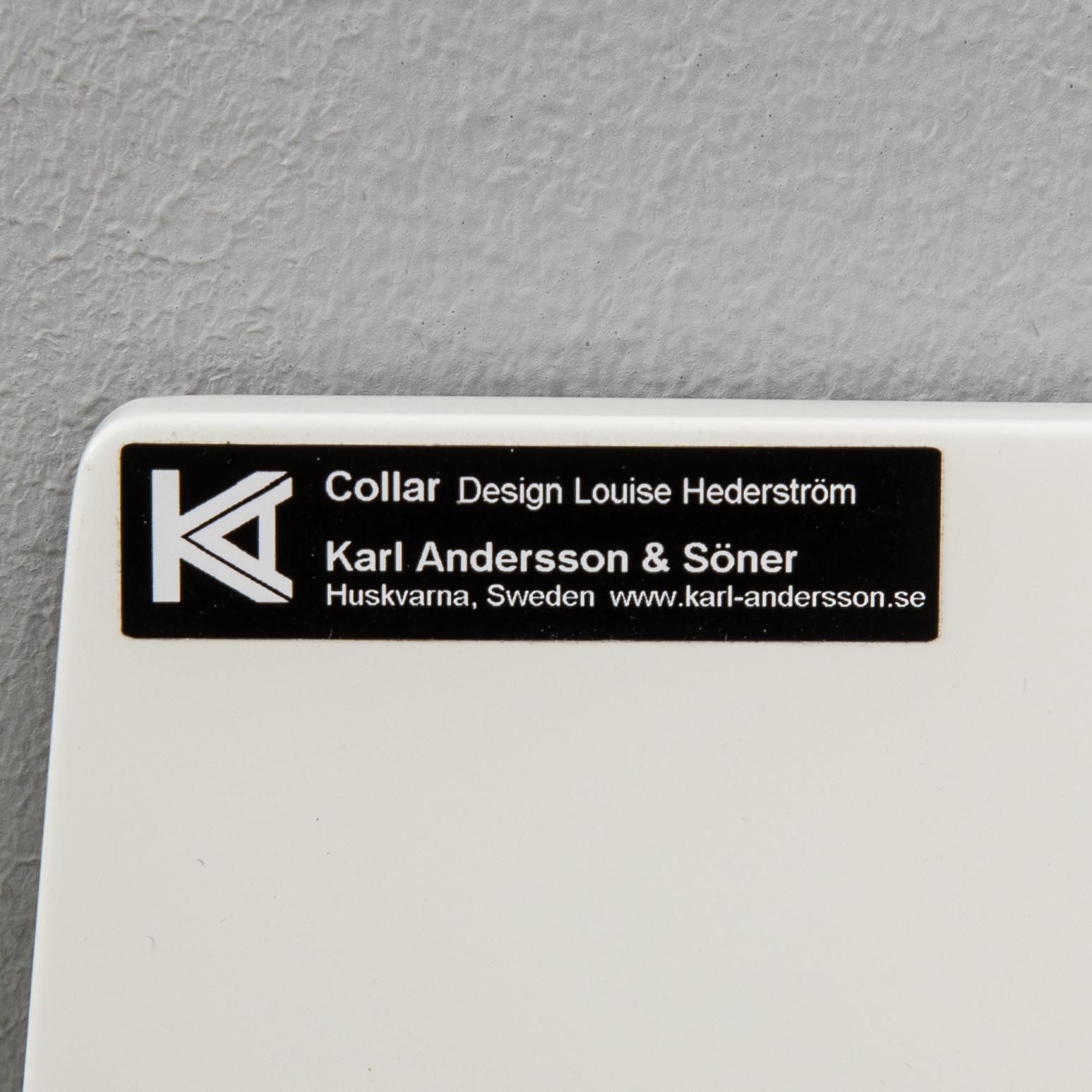 Louise Hederström newspaper racks 2 pcs "Collar" for Karl Andersson & Söner 2000s.