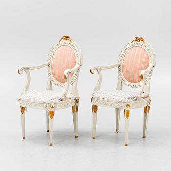 A pair of Gustavian armchiars, 19th century.