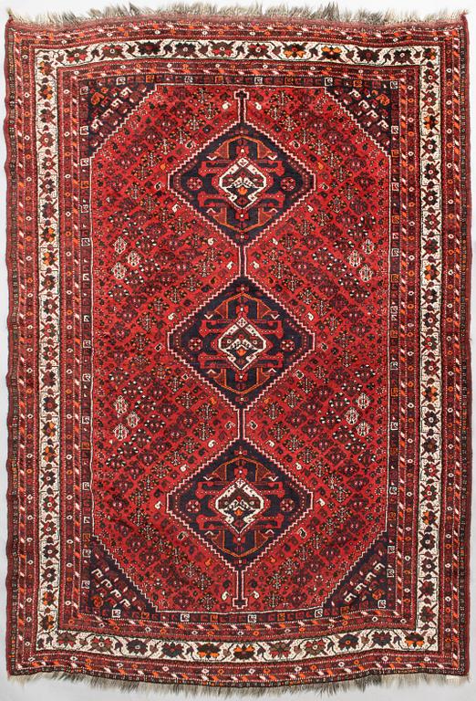 A oriental  carpet. Ca 220x320 cm.
