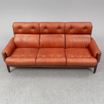 A 1960's/70's three-piece furniture suite.