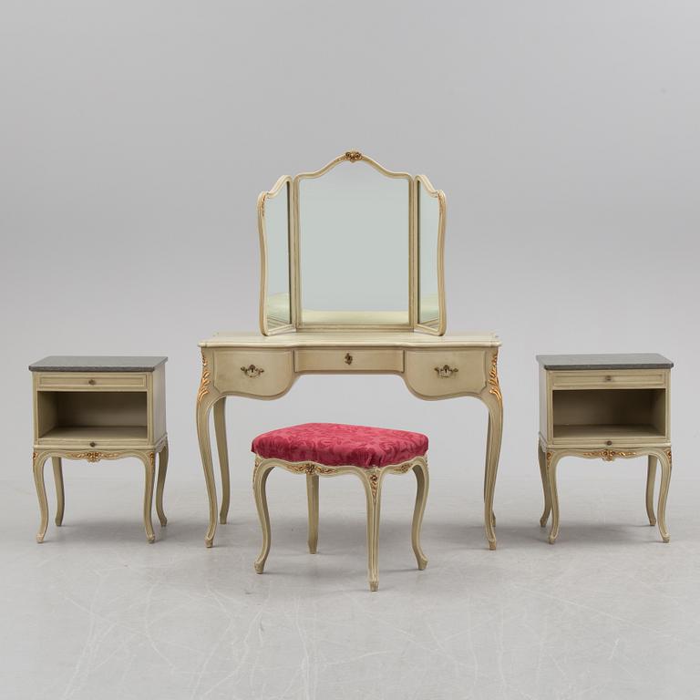 A mid 20th century Rococo style dressing table, a pair of bedside tables and one stool.