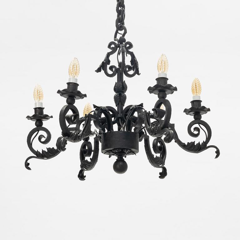 A black painted iron chandelier,