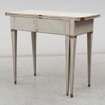 a late gustavian game table from around 1800.