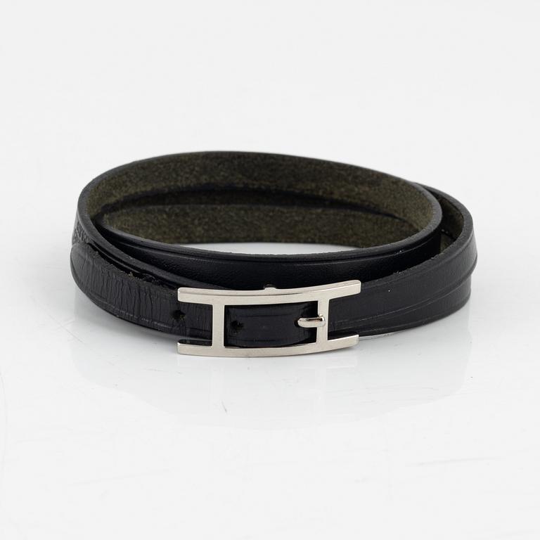 Hermès, a black leather 'Behapi' bracelet.