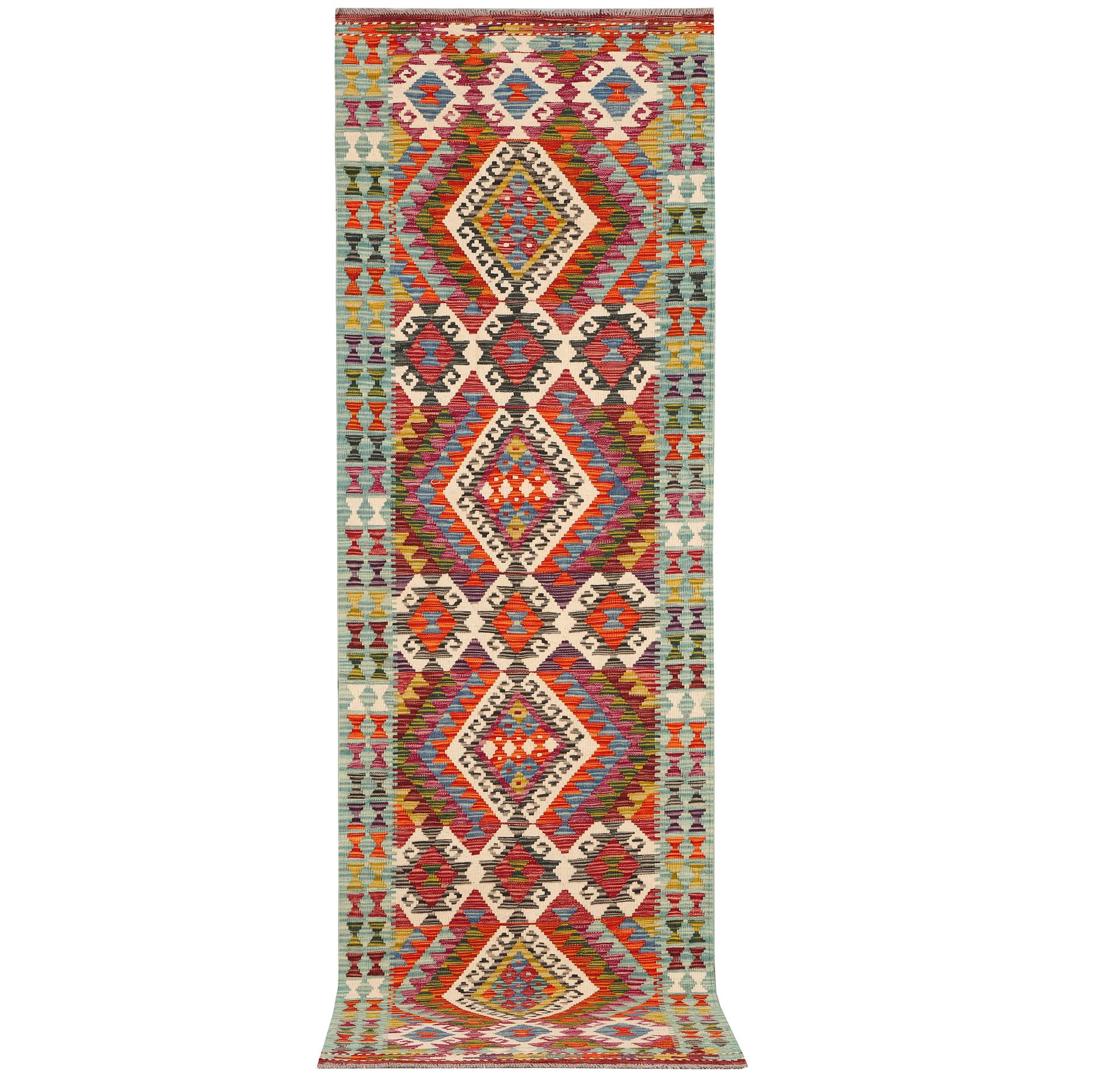 An Afghan kilim runner, c. 294 x 82 cm.