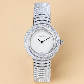 1070. Cartier, Trinity, "Diamond set case and bracelet", ca 2000.