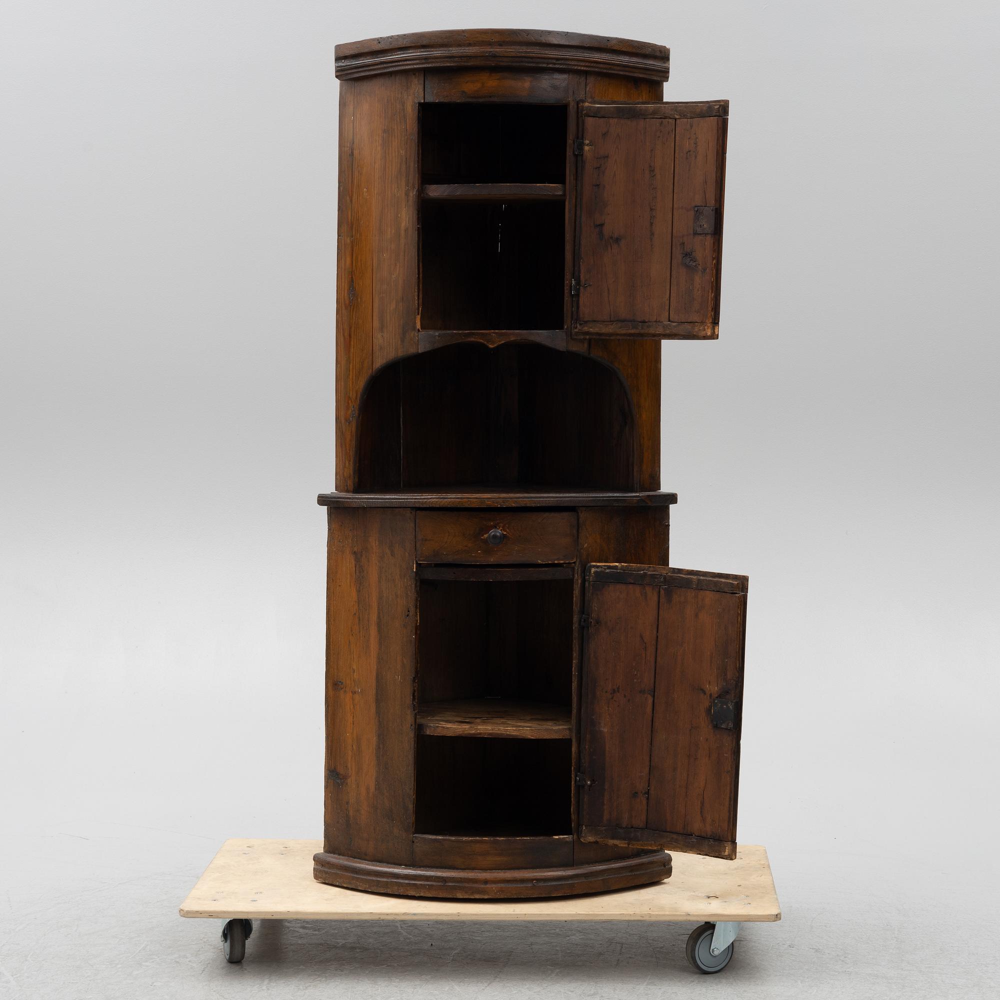 Corner cupboard, folk art, circa 1800.