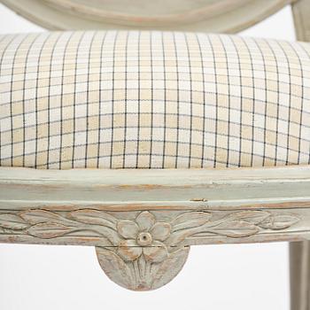 A pair of Gustavian open armchairs, Stockholm, late 18th century.