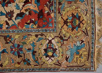 A RUG. An antique silk Kashan so called Motachem. 202,5 x 136,5 cm.