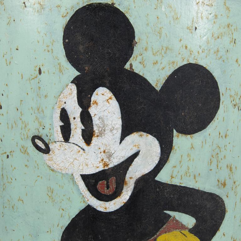 A metal Mickey Mouse fire screen, mid 1900s.