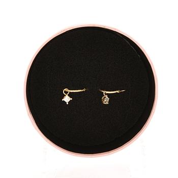 Earrings, a pair of hoops with pendants, one with a round brilliant-cut diamond, the other with a princess-cut diamond.