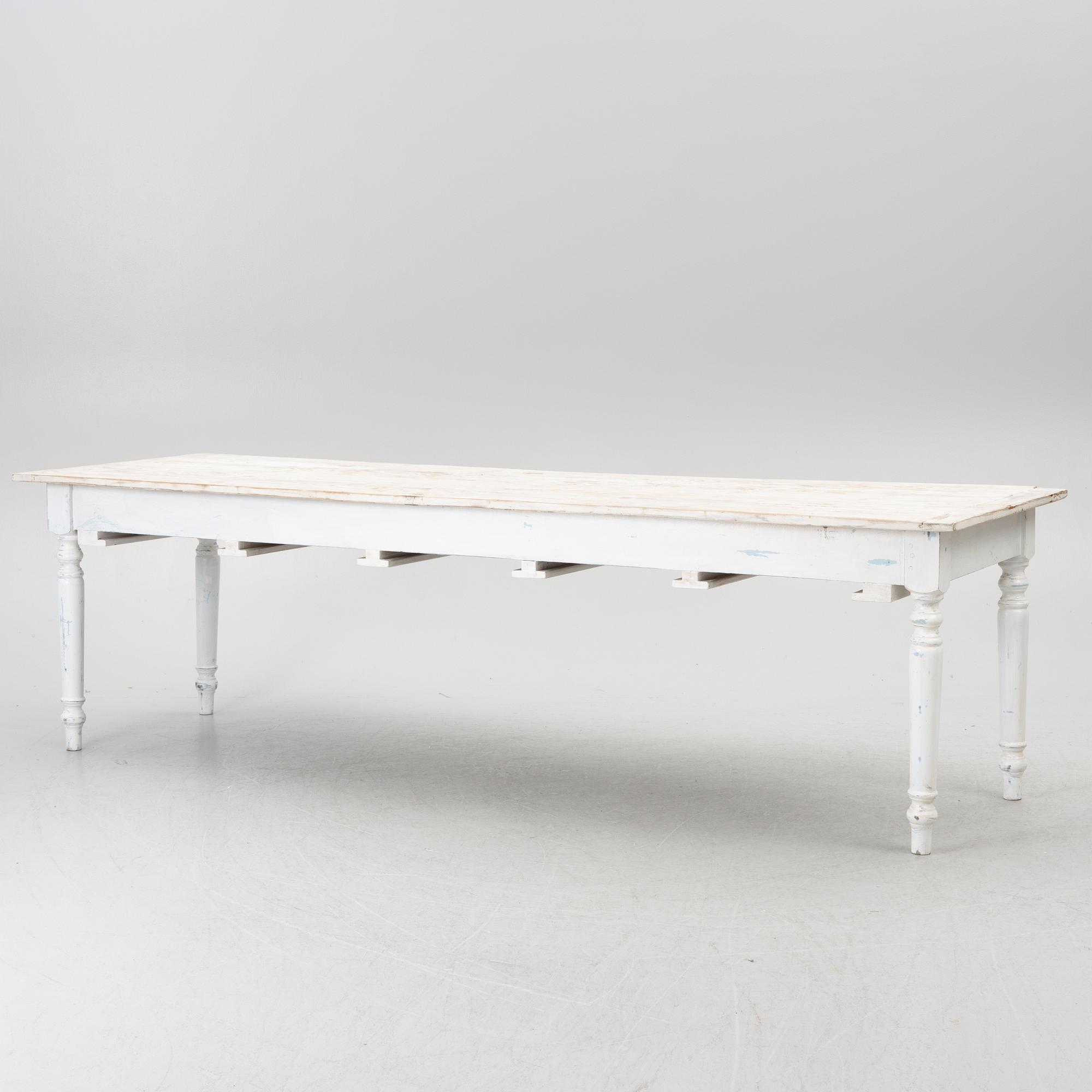 A table with stools, 20th/21st century.