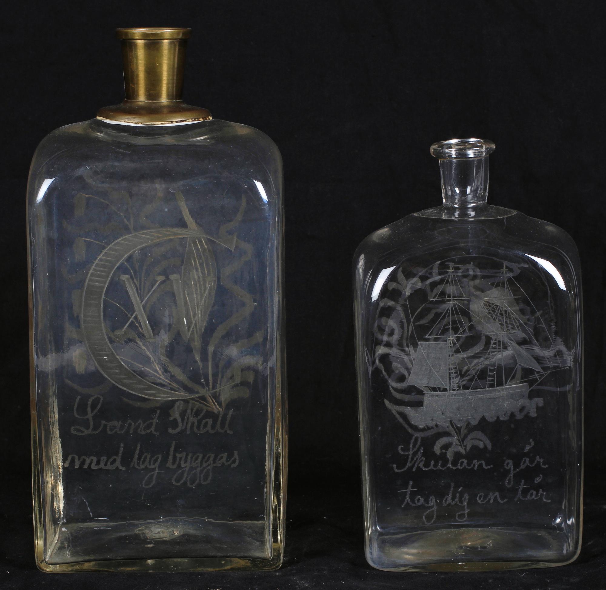 BRÄNNVINSFLASKOR, 2 st, glas, 1800-tal.