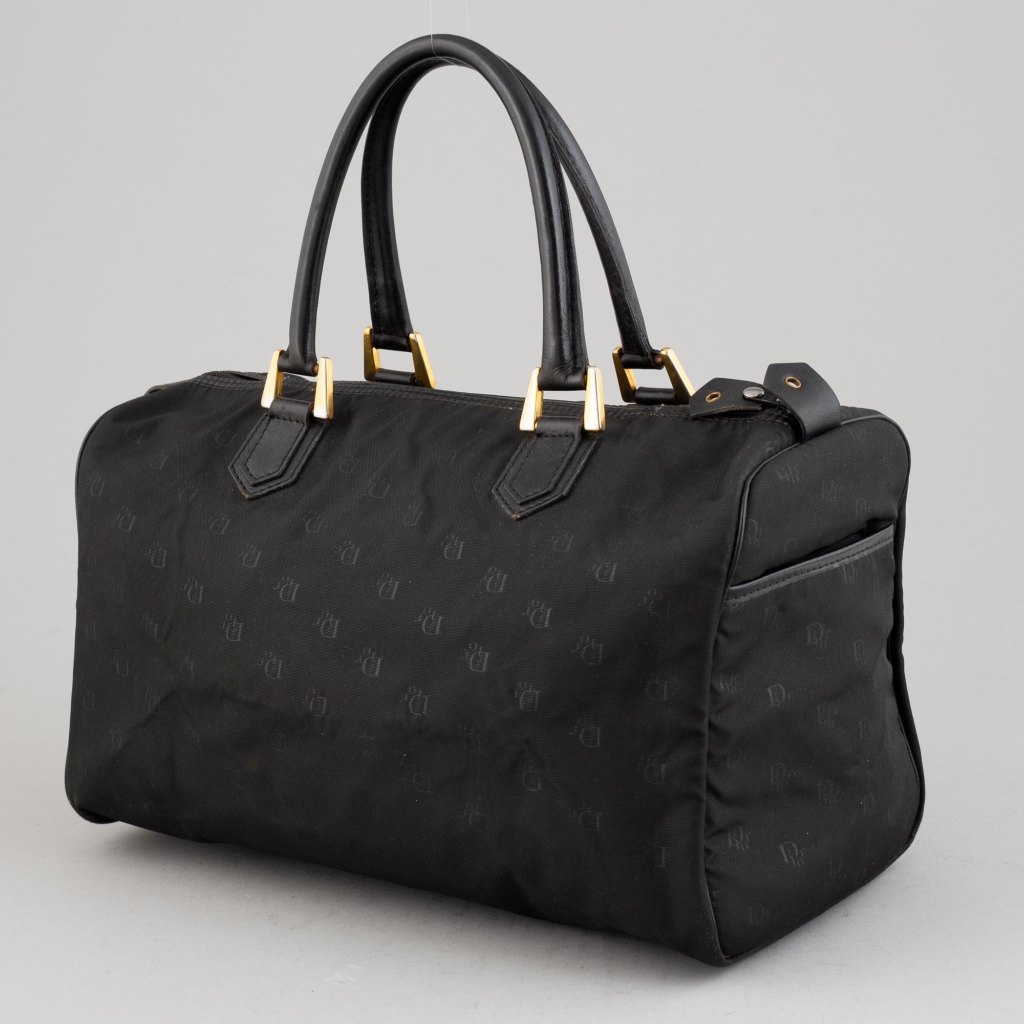 Christian Dior, a brack canvas 
'Speedy' handbag.