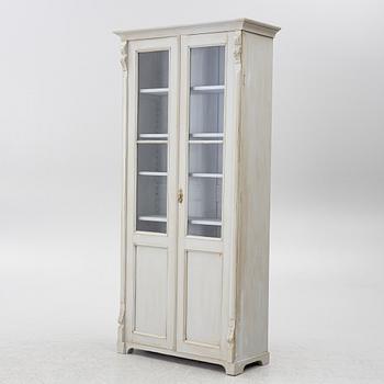 Display cabinet, circa 1900.