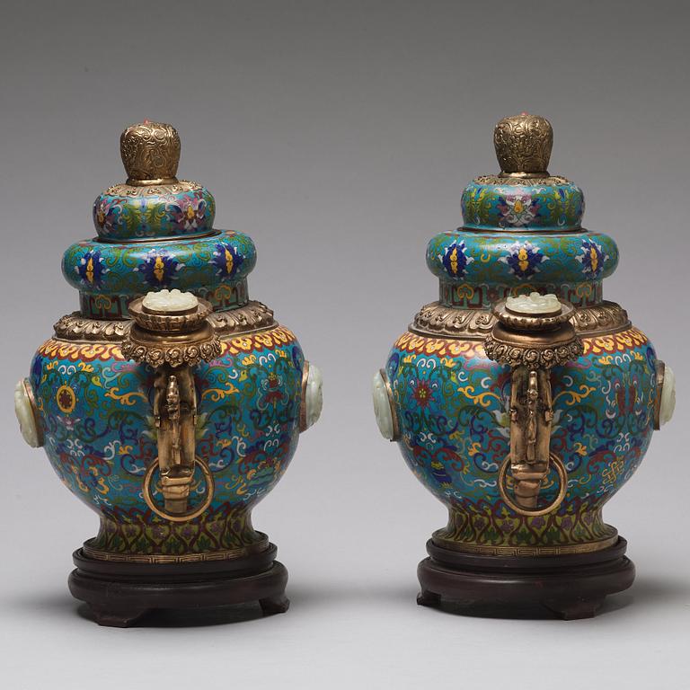 A pair of chinese cloisonne jars with covers with nephrite placques, 20th Century.