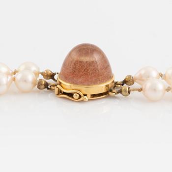 Two strand cultured pearl necklace, 18K gold clasp with rutile quartz.